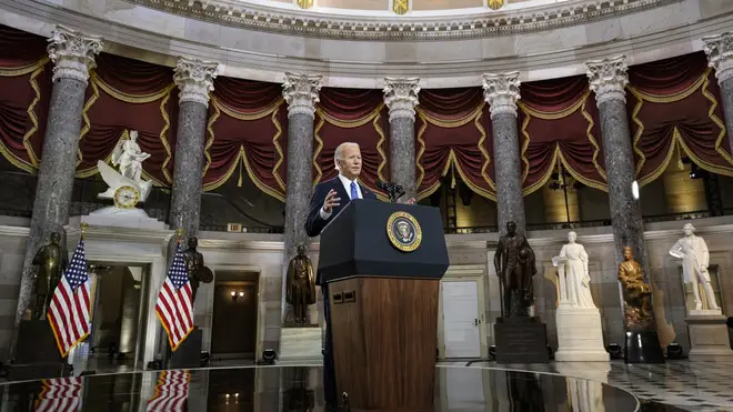 President Joe Biden speaks from Statuary Hall at the US Capitol to mark the one-year anniversary of the January 6 riot at the US Capitol by supporters loyal to then-president Donald Trump, in Washington