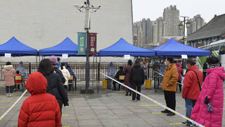 Residents in Tianjin queue up to receive a coronavirus test