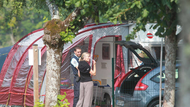Police investigate the holiday campsite after the 2012 shooting of members of the al-Hilli family