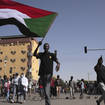 People march during a protest to denounce the October 2021 military coup, in Khartoum, Sudan