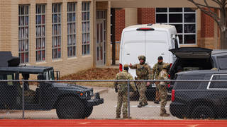 SWAT team members deployed to the synagogue, where a hostage-taker died