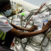 A shipment of Covid-19 vaccines distributed by the Covax Facility arrives in Abidjan, Ivory Coast