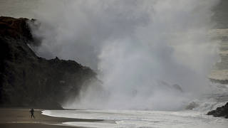 Large waves crash ashore at Wrights Beach, north of Bodega Bay, California, following a massive undersea volcanic explosion of the Hunga Tonga Hunga Ha’apai volcano in Tonga. (Kent Porter/The Press Democrat via AP)