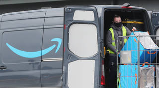 Amazon delivery vans being packed
