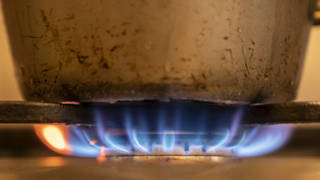 A saucepan on a gas hob