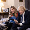 Boris Johnson and his wife Carrie Johnson, with their daughter Romy