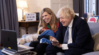 Boris Johnson and his wife Carrie Johnson, with their daughter Romy