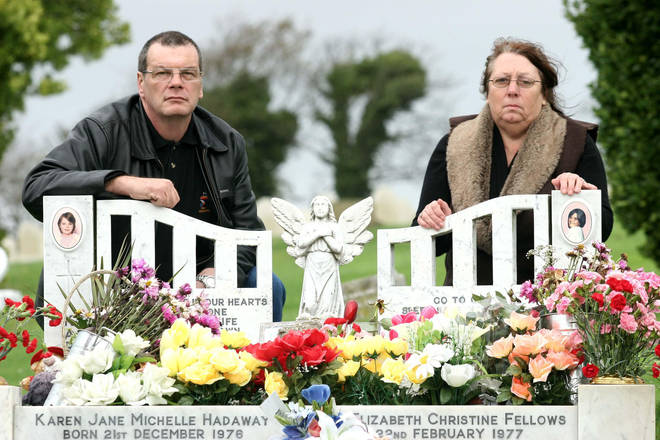 Sue Eismann, mother of Nicola Fellows, with her brother in law Nigel Heffron, by the grave of Karen Hadaway and Nicola Fellows in Brighton.