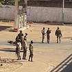 Soldiers stand outside a military base in Burkina Faso’s capital Ouagadougou (Sam Mednick/AP)