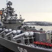 The Russian navy’s missile cruiser Marshal Ustinov sails off for an exercise in the Arctic
