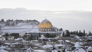 Snow covers the Dome of the Rock Mosque in the Al Aqsa Mosque compound in Jerusalem Old city (Mahmoud Ilean/AP)