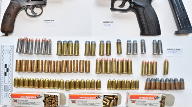 The investigation led to detectives uncovering a cache of firearms and ammunition