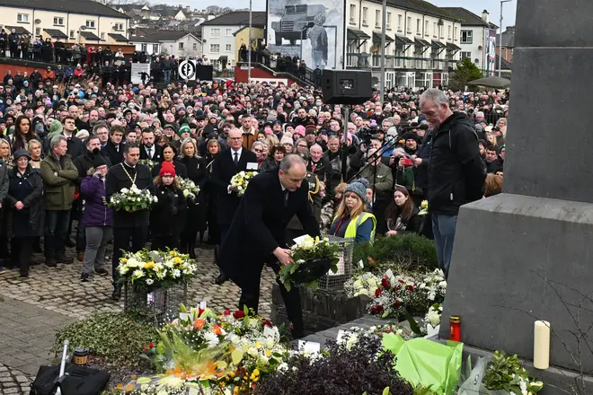Taoiseach Micheál Martin lays a wreath at Memorial Garden during a Walk of Remembrance to mark the 50th Anniversary of Bloody Sunday.