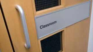 Scottish officials want to trim the bottoms off thousands of classroom doors