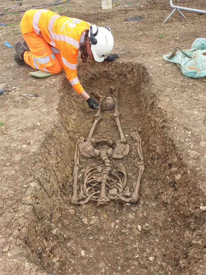 Researchers found remains with the head placed between the legs