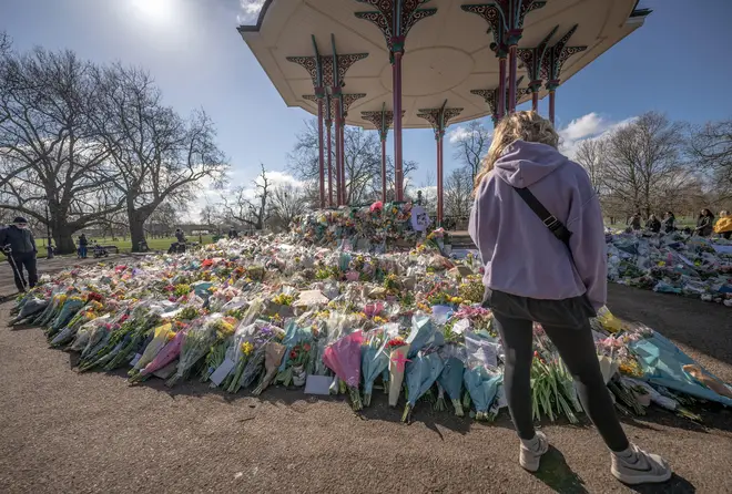 Floral tributes continue at Clapham Common bandstand