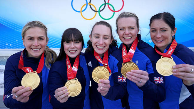 Left to right: Mili Smith, Hailey Duff, Jennifer Dodds, Vicky Wright and Eve Muirhead celebrate with their gold medal