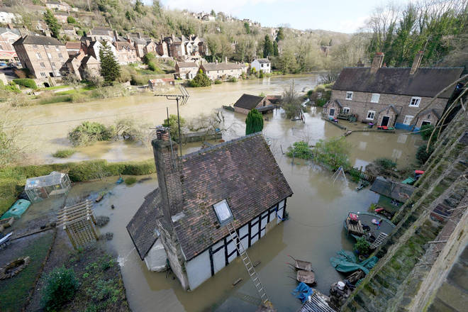 Flooded properties next to the River Severn following high winds and wet weather in Ironbridge, Shropshire