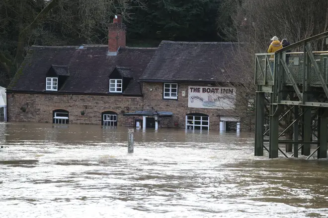 Flood waters from the River Severn surround The Boat Inn at Jackfield near Ironbridge