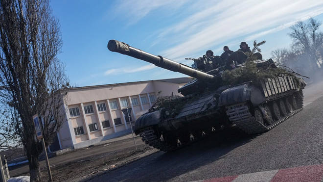 A Ukrainian tank moves following Russia's military operation.