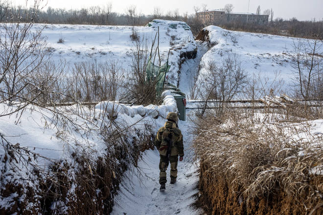 Ukrainian servicemen of the 24th Brigade are seen outside of Zolote, Ukraine