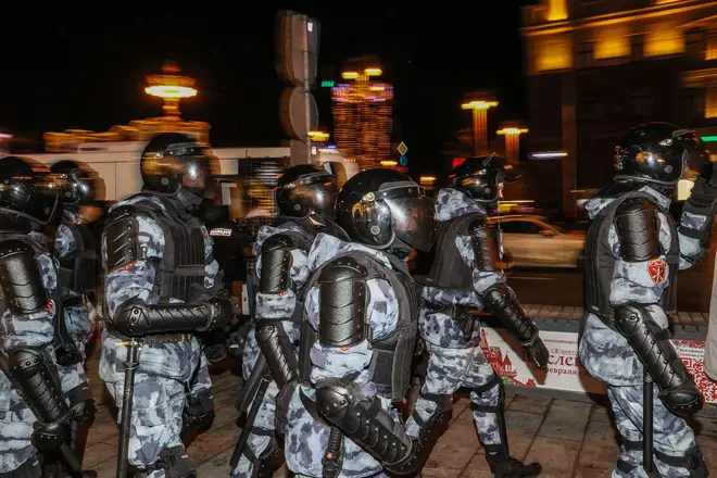 Riot police are seen during an unsanctioned anti-war protest in Pushkin Square