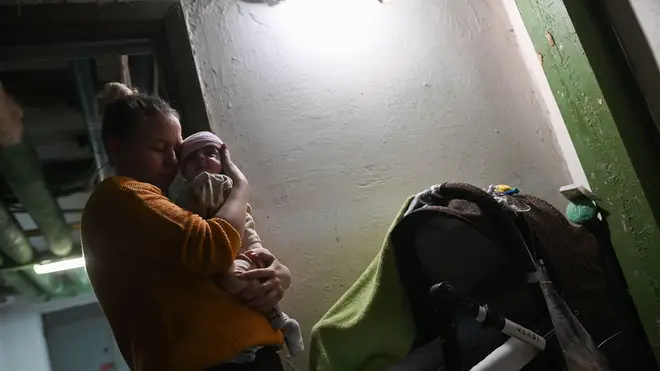 Mothers and their newborns live underground while medical personnel continue to provide care at Okhmadyt Hospital in Kyiv