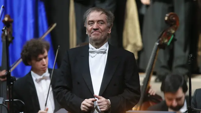 Valery Gergiev looks on after a “pre-premiere” performance, put on for veterans and senior employees of the theatre in the new Mariinsky Theatre (Dmitry Lovetsky/AP)