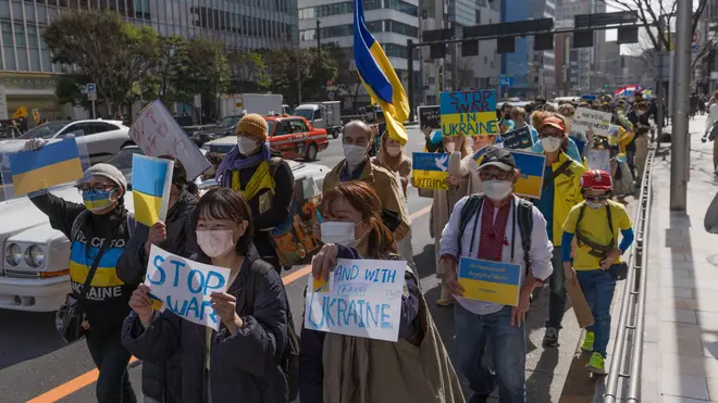 Hundreds of people marched in central Tokyo protesting Russia's invasion of Ukraine.