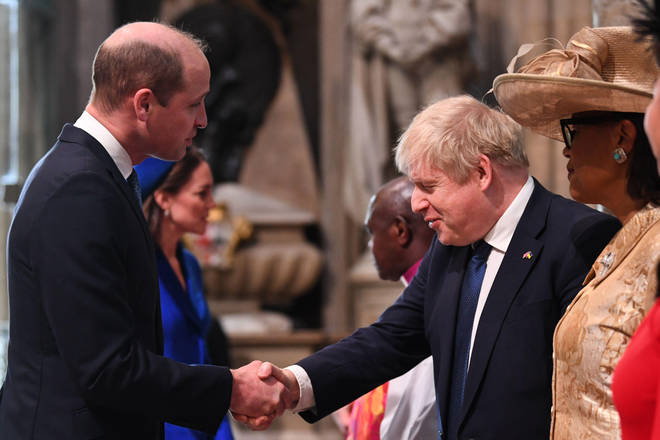 The Duke of Cambridge shakes hands with Prime Minister Boris Johnson as he arrives at the Commonwealth Service at Westminster Abbey in London on Commonwealth Day.