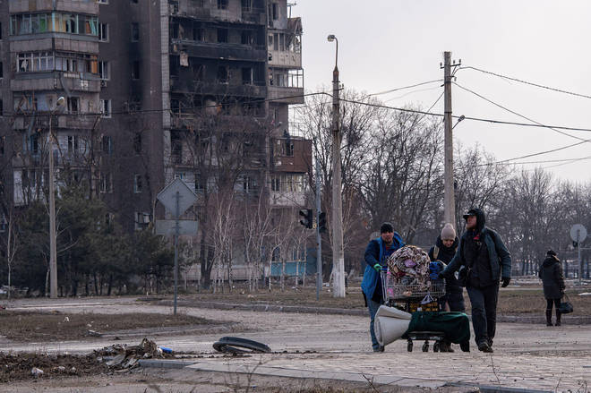 Russian forces bombed a school where 400 people were taking shelter, officials said