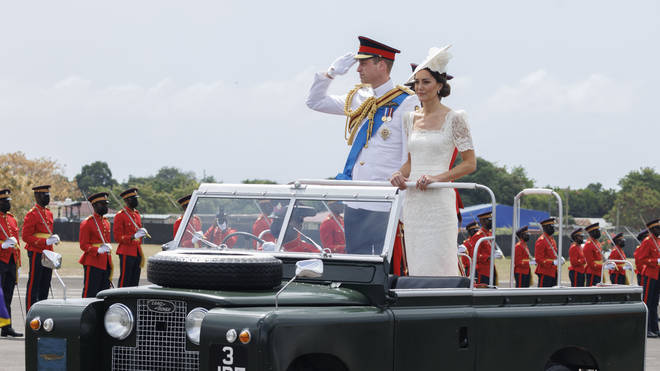 Prince William and Kate took in a parade from an open top Land Rover