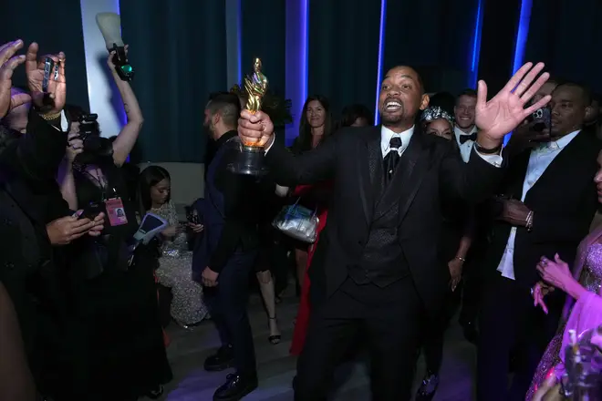 Will Smith dancing with his Oscar at the Vanity Fair after-party