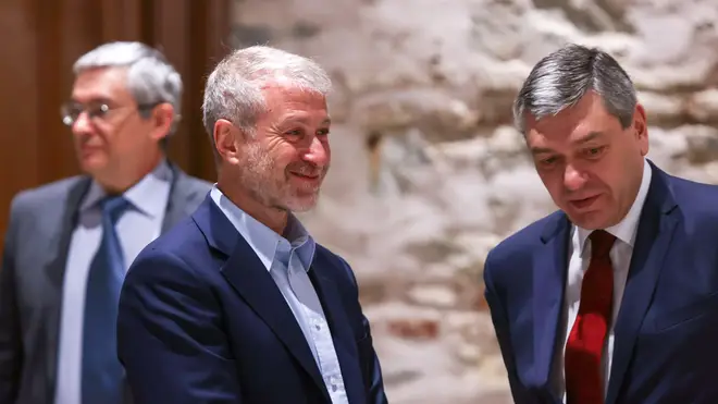 Roman Abramovich (left) was at the peace talks on Tuesday