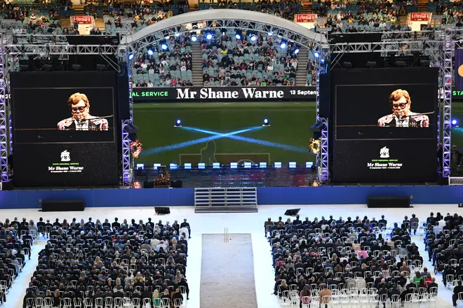 Elton John performs via video link from the United States during the state memorial service for former Australian cricketer Shane Warne.