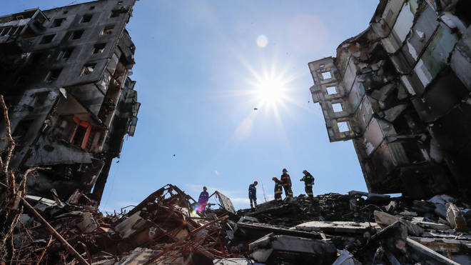 Rescuers conduct a search and rescue operation at the wreckage