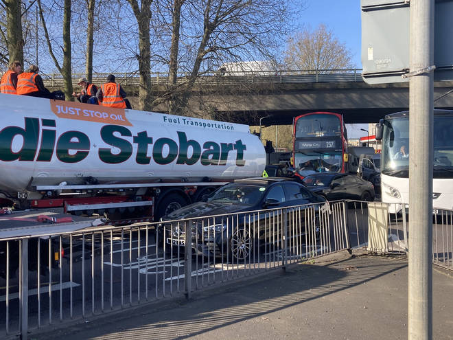 Protesters climbed onto a lorry in Chiswick