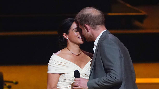 The Duke and Duchess of Sussex shared a kiss during the Invictus Games opening ceremony