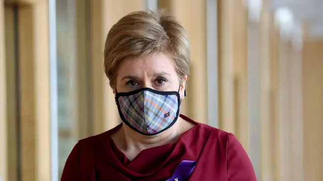 Nicola Sturgeon has been reported to police after footage showed her apparently breaching Scotland's Covid face mask law