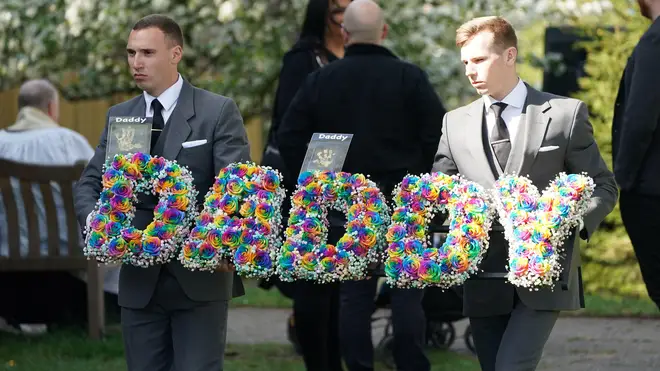 A sign saying Daddy is taken into the church