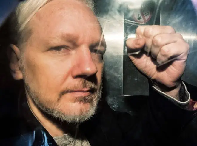 Julian Assange in prison van in 2019