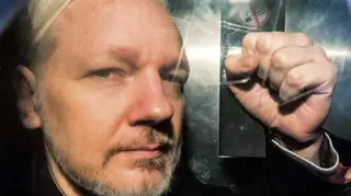 Julian Assange in prison van in 2019