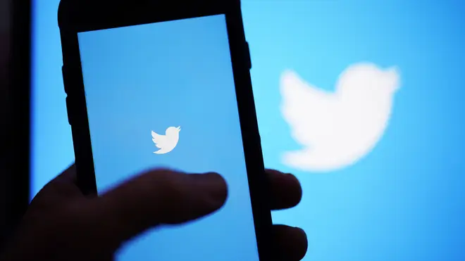 The Twitter logo on a digital device