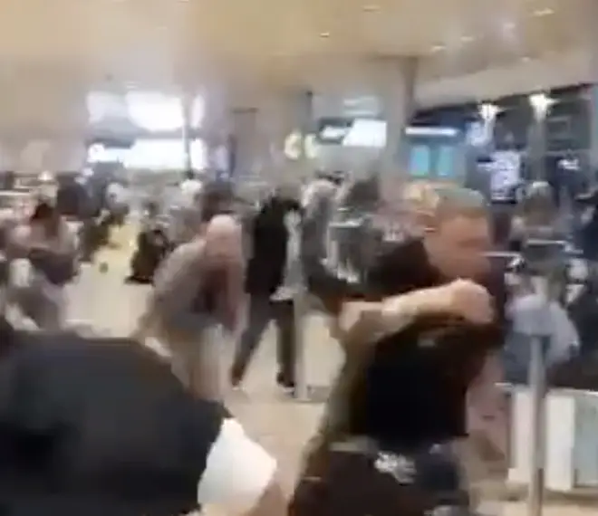 Passengers ducked for cover, ran and screamed at the departure hall of Ben Gurion International Airport