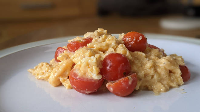 Eggs and tomatoes made by a human