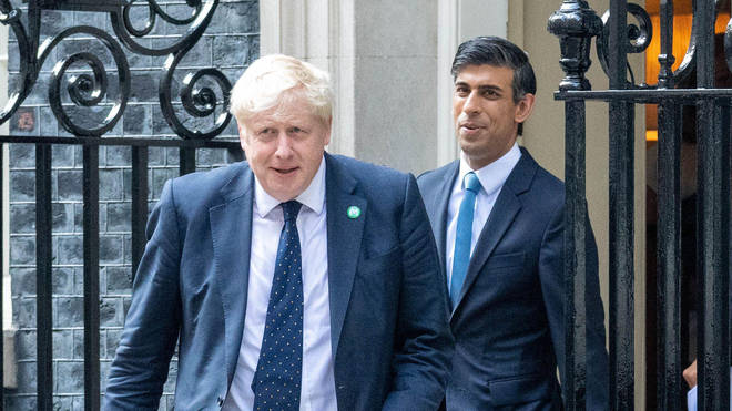 Boris Johnson and Rishi Sunak leaving Downing Street no.10