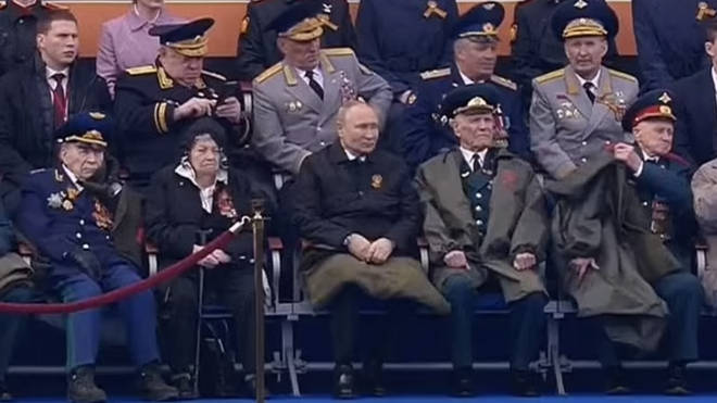 Putin, 69, also had his legs covered by a blanket for the military parade despite sitting among a group of veterans who did not have their laps covered.