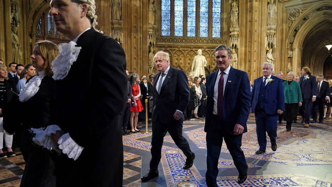 Boris Johnson joked with Sir Keir Starmer as they arrived for the Queen's Speech