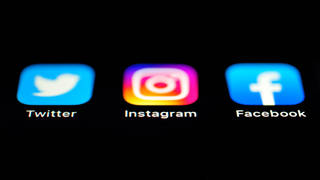 A view of the Twitter, Instagram and Facebook apps on an iPhone