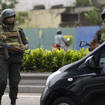Soldiers man a checkpoint outside the prime minister’s residence in Colombo, Sri Lanka